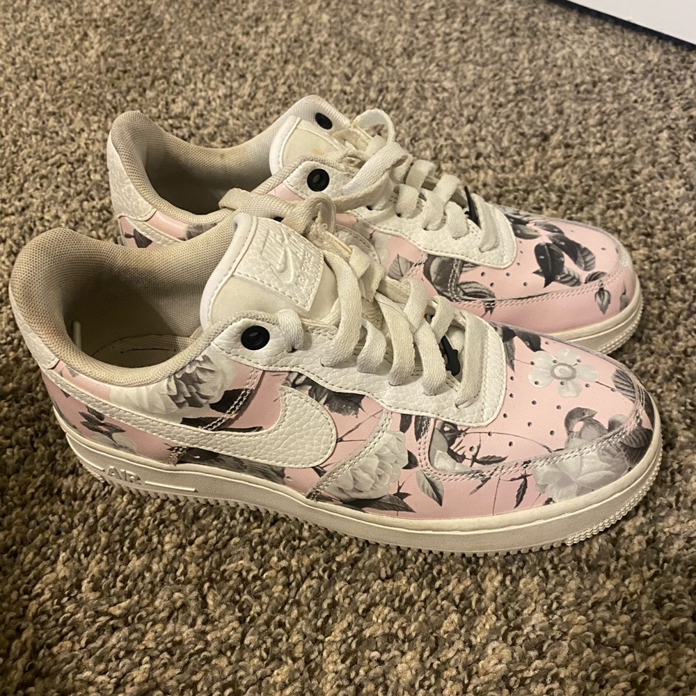 Pink and White Nike Forces
